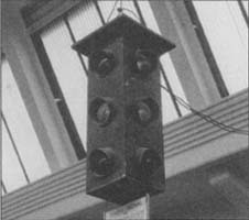 Installed in Detroit in 1920, this was the nation's first three-color, four-way traffic light. (From the collections of Henry Ford Museum & Greenfield Village.)